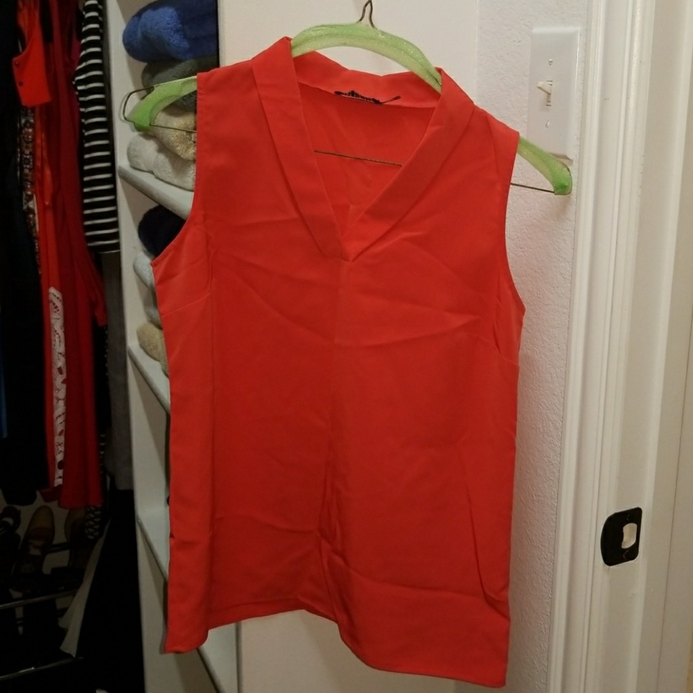 Orange top.